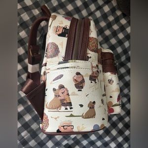 EXCELLENT CONDITION Exclusive LoungeFly UP Pixar Backpack
(With Tags)